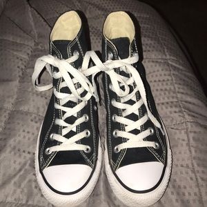 black high top chuck taylor converse.